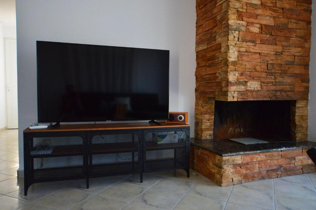 TV a/nebo společenská místnost v ubytování S-EVA RESORT