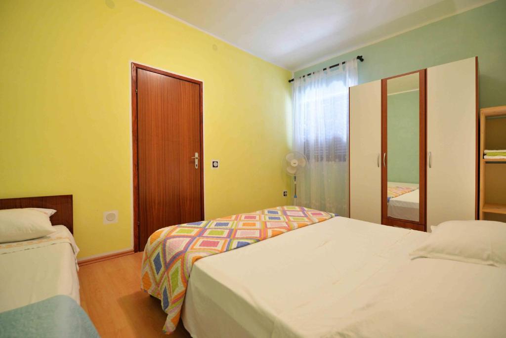 Postel nebo postele na pokoji v ubytování Apartment Zena