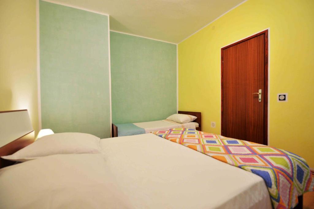 Postel nebo postele na pokoji v ubytování Apartment Zena