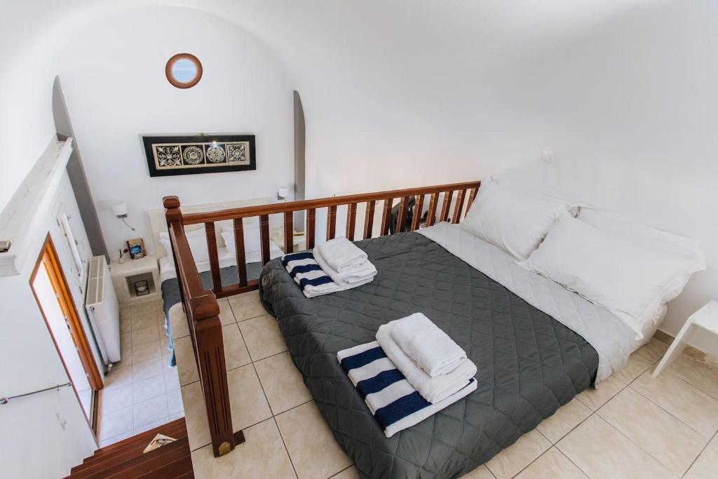 Postel nebo postele na pokoji v ubytování Sun Stories Suites