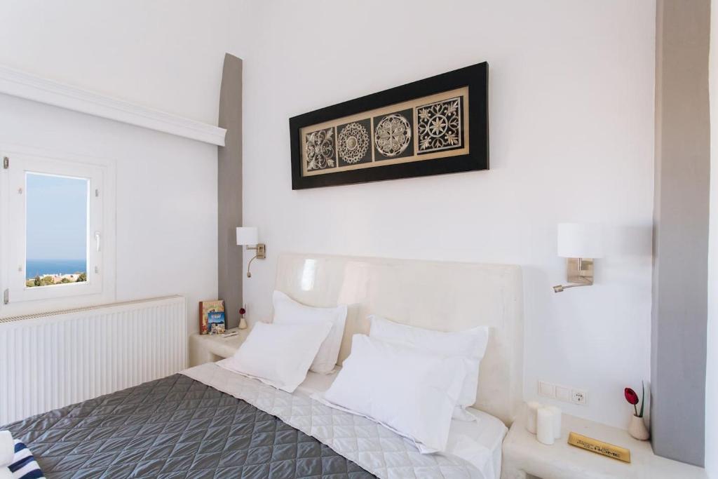 Postel nebo postele na pokoji v ubytování Sun Stories Suites