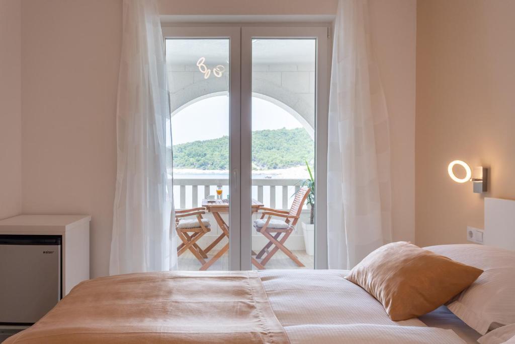 Posteľ alebo postele v izbe v ubytovaní Villa Stonehouse