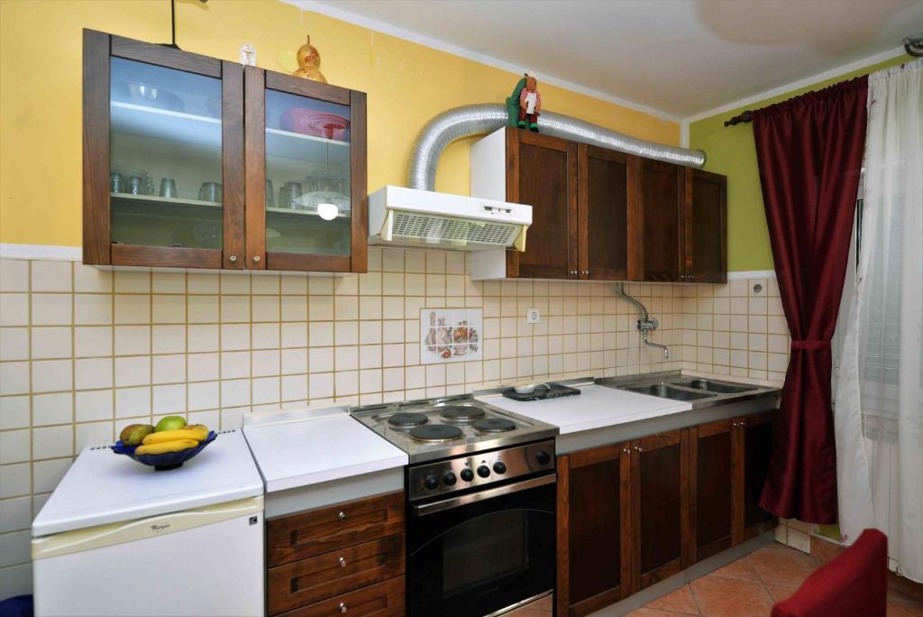 Kuchyň nebo kuchyňský kout v ubytování Apartment Zena