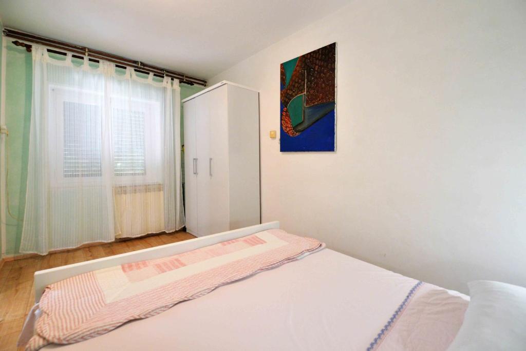 Postel nebo postele na pokoji v ubytování Apartment Zena