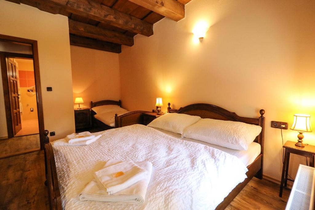 Postel nebo postele na pokoji v ubytování Villa Marie