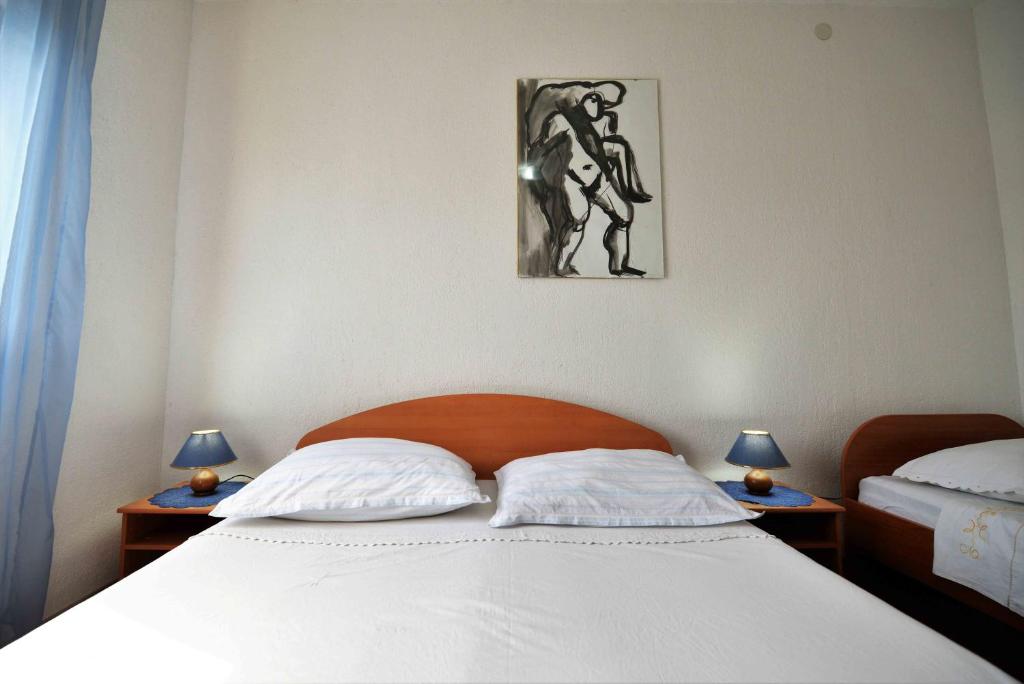 Postel nebo postele na pokoji v ubytování Apartment Zena