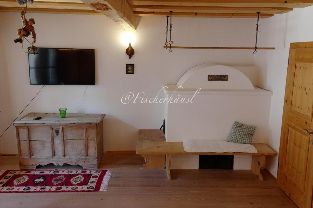 TV a/nebo společenská místnost v ubytování Fischerhaus Sankt Wolfgang Appartement 1