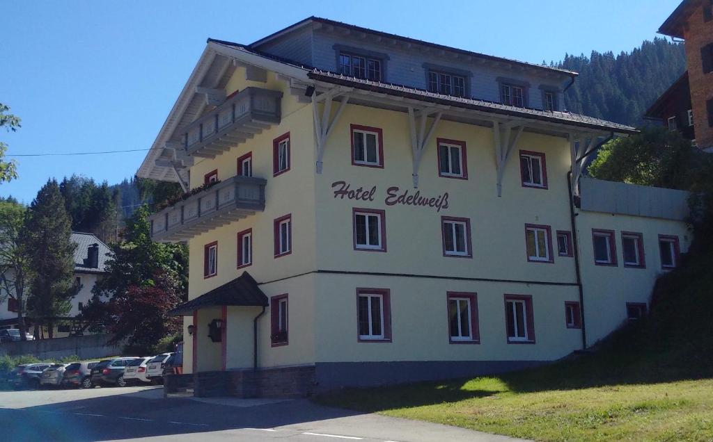 a large building with the words first edinburgh on it at Pension Edelweiss in Gargellen