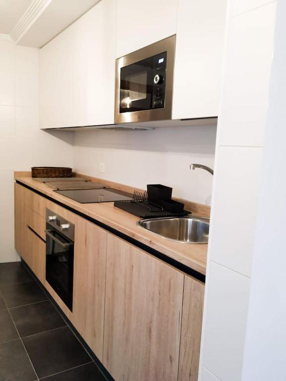 Kuchyň nebo kuchyňský kout v ubytování Living Burgos