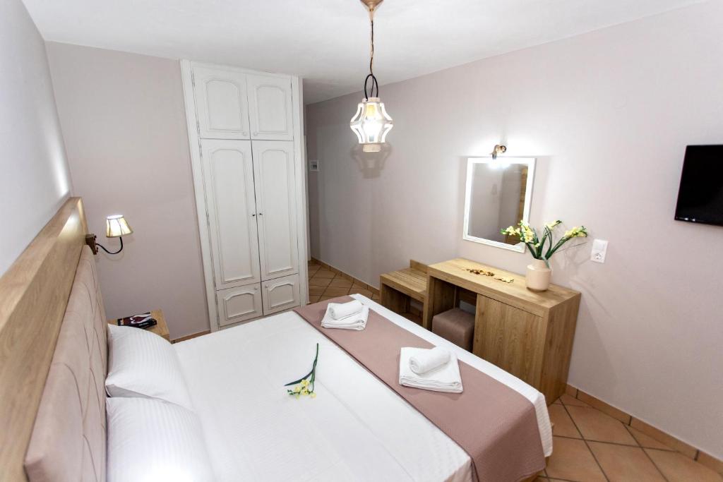 Postel nebo postele na pokoji v ubytování Caretta - Caretta Hotel