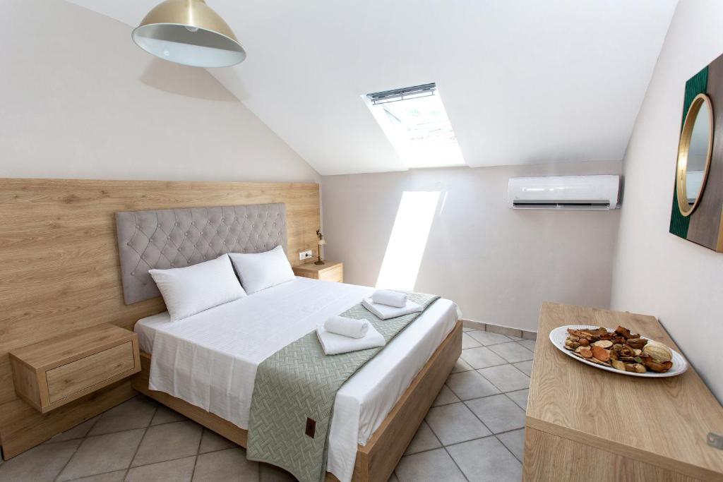 Postel nebo postele na pokoji v ubytování Caretta - Caretta Hotel