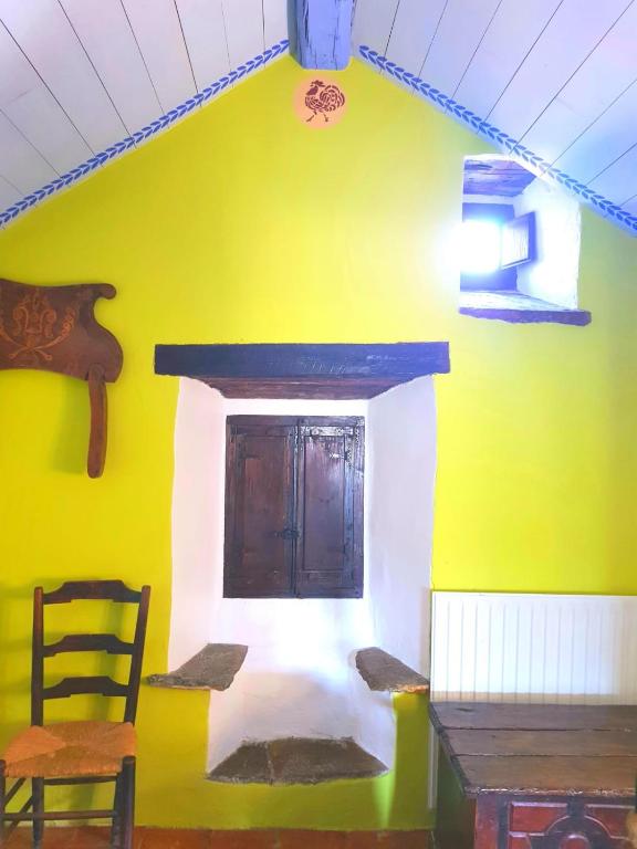 Postel nebo postele na pokoji v ubytování CASA-ABADÍA DE BANAGUÁS