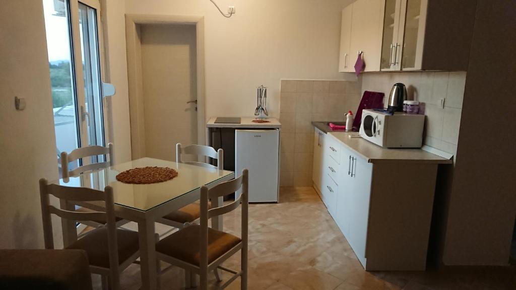 Kuchyň nebo kuchyňský kout v ubytování Luce di Sole Apartment