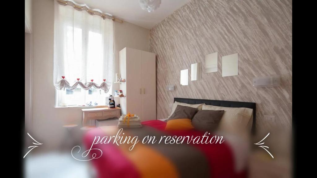 Postel nebo postele na pokoji v ubytování Il Quadrifoglio guesthouse