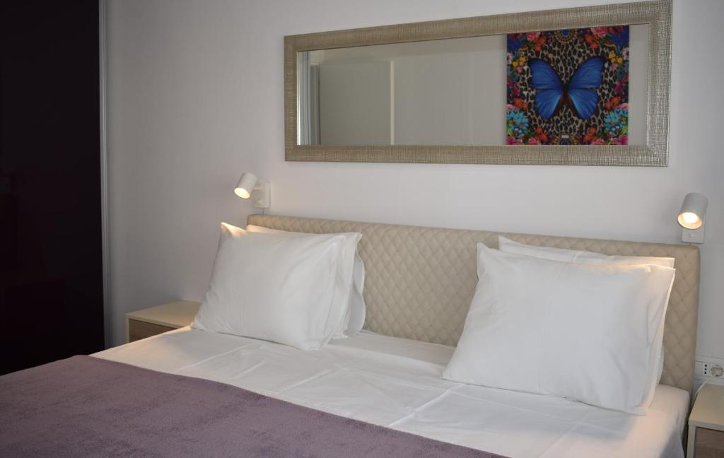 Posteľ alebo postele v izbe v ubytovaní Marlin Apartments