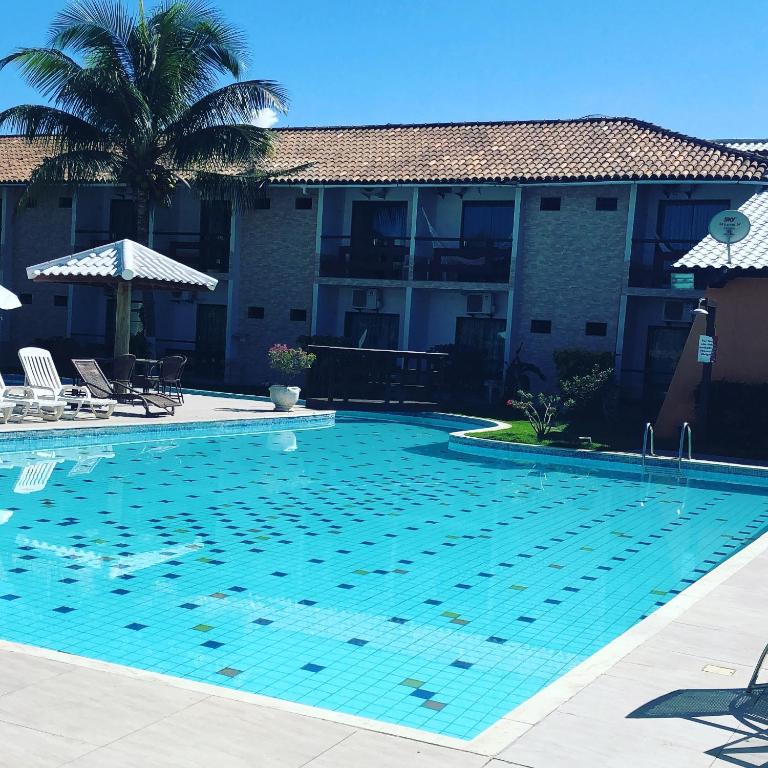 Bazén v ubytování Porto Bali Hotel nebo v jeho okolí