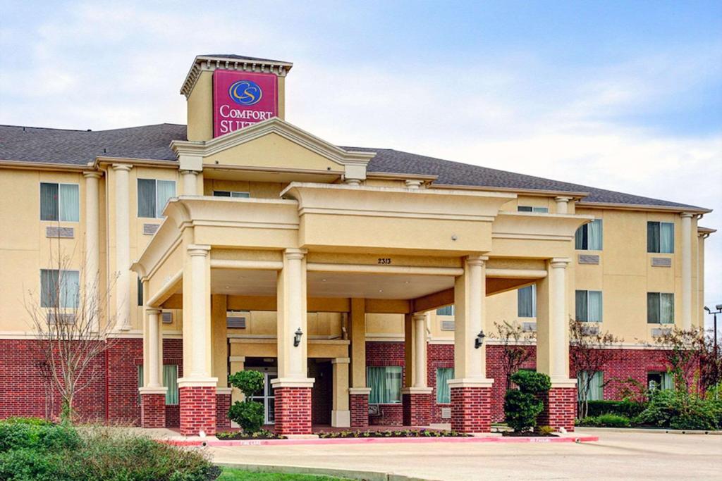 a rendering of the front of a hotel at Comfort Suites Texas Ave in College Station