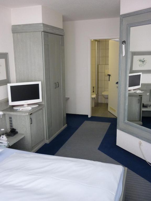 TV a/nebo společenská místnost v ubytování Avenue Hotel