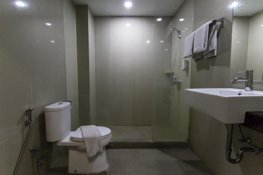Koupelna v ubytování Winstar Hotel