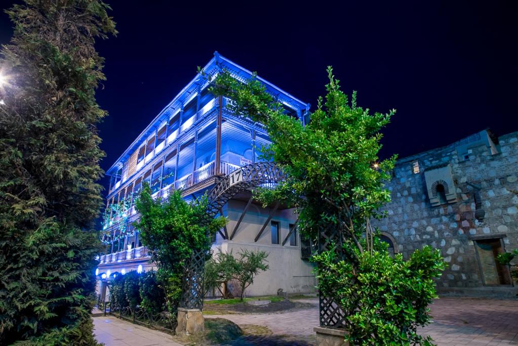 a building with blue lights on the side of it at Urban 1861 in Tbilisi City