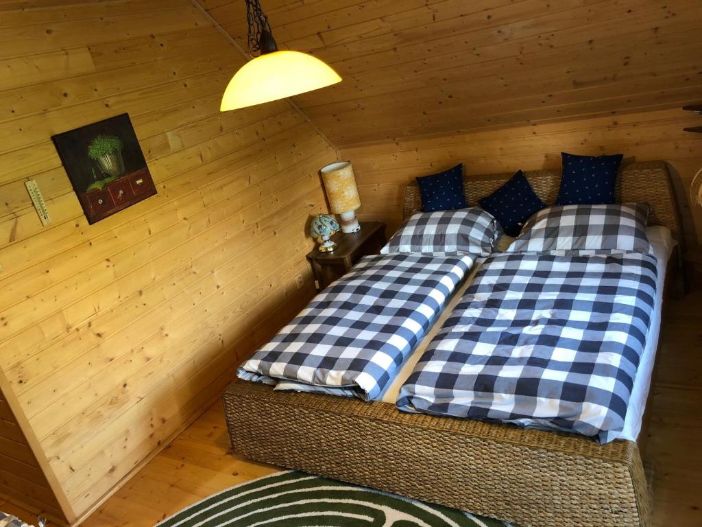 Postel nebo postele na pokoji v ubytování Chata Studnička