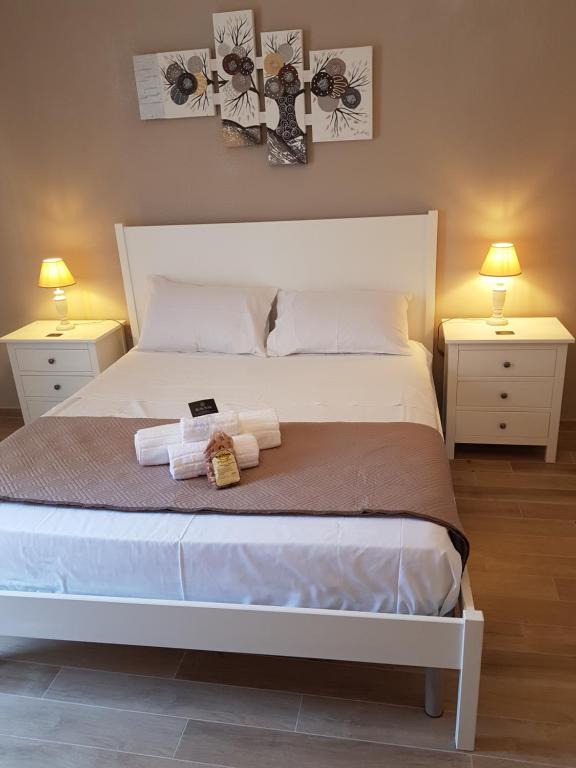 Łóżko lub łóżka w pokoju w obiekcie Royal House