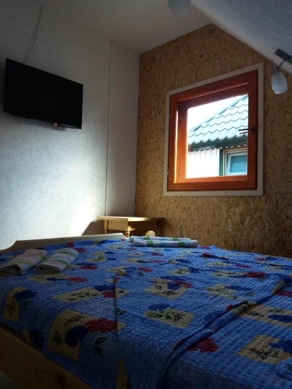Postel nebo postele na pokoji v ubytování Guest House Vukicevic