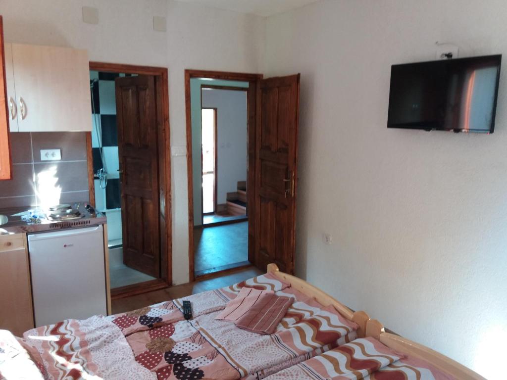 Postel nebo postele na pokoji v ubytování Guest House Vukicevic