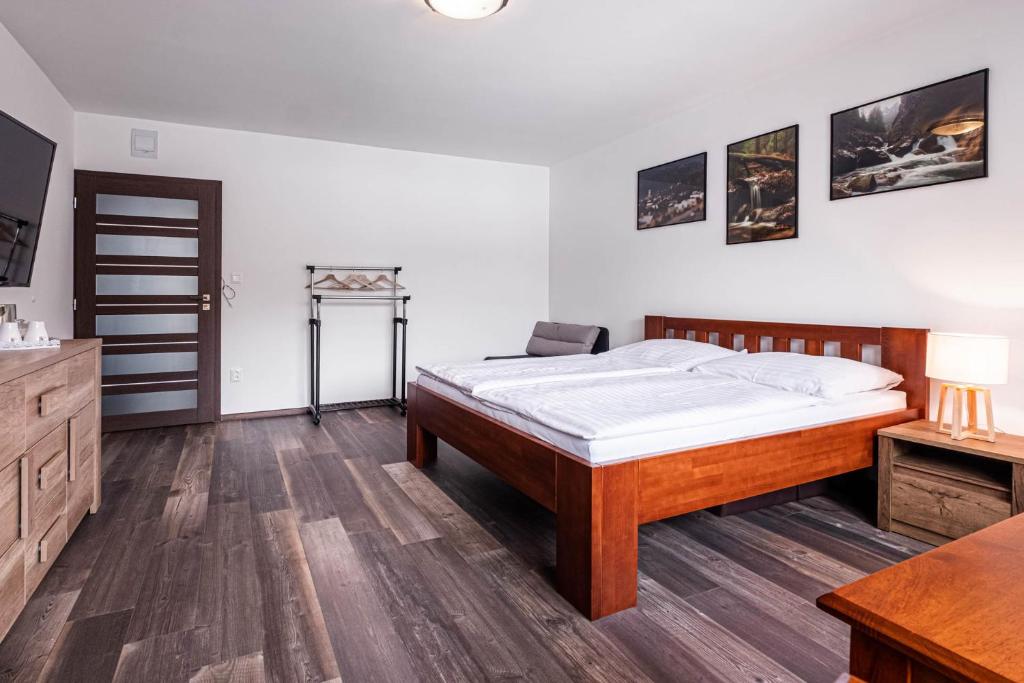Letto o letti in una camera di Apartmány Jánošík
