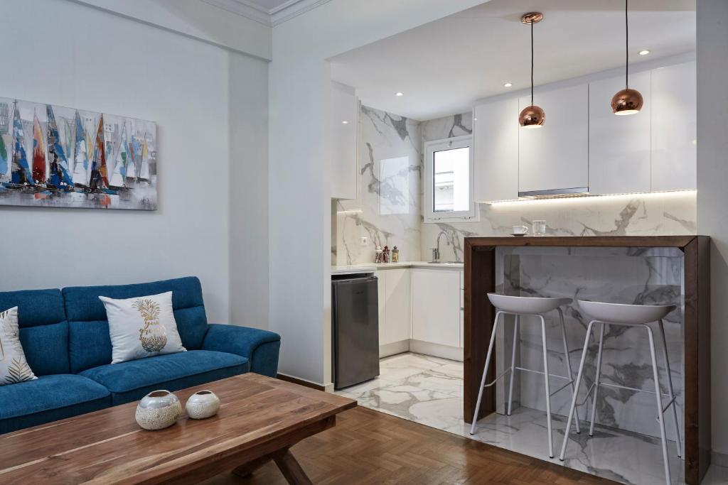A kitchen or kitchenette at Cozy and Bright 2BD Apartment in Kolonaki