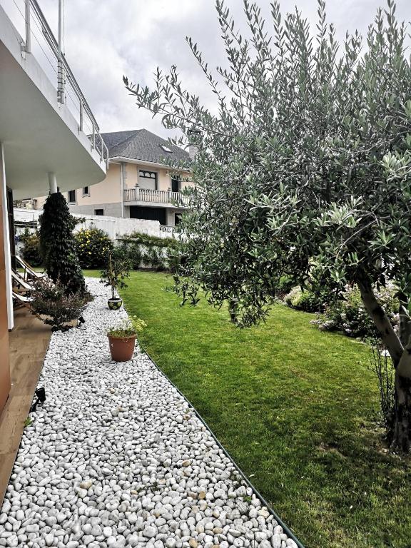 Vonkajšia záhrada v ubytovaní Hotel Herbeira