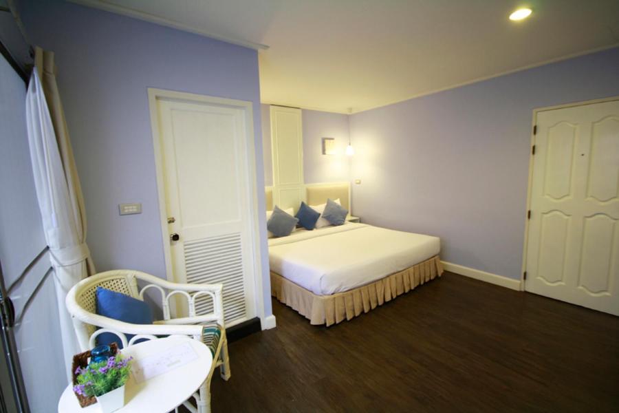 Postel nebo postele na pokoji v ubytování Hotel Alley
