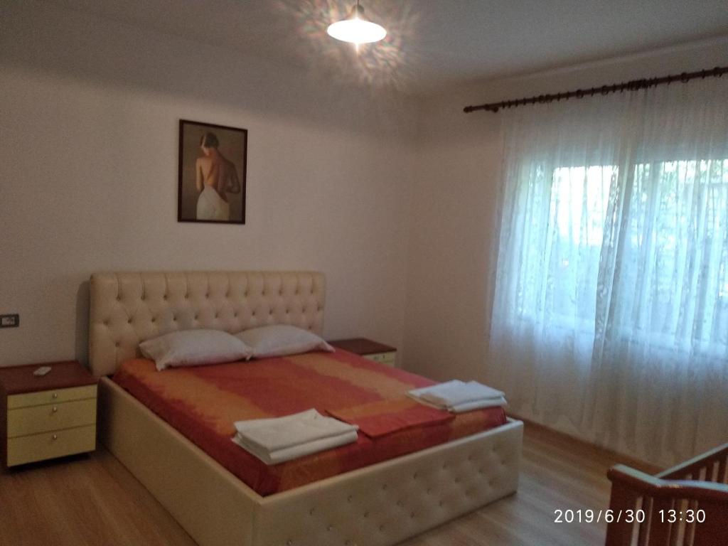 Postel nebo postele na pokoji v ubytování Casa Prifti