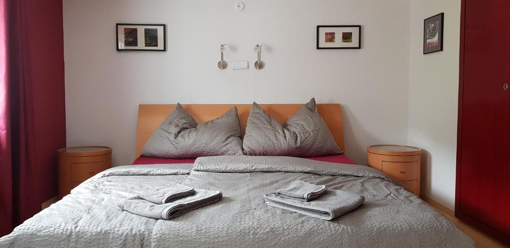 Кровать или кровати в номере Casa Cuschina - mit Sauna