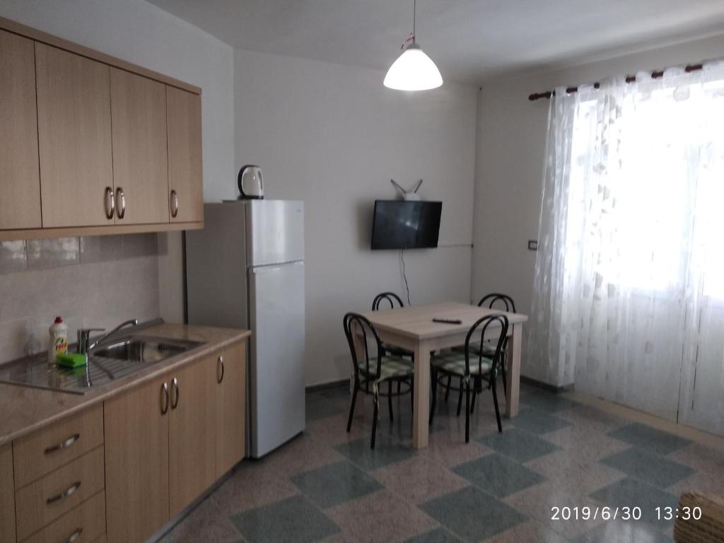 Kuchyň nebo kuchyňský kout v ubytování Casa Prifti