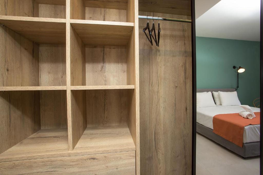 Posteľ alebo postele v izbe v ubytovaní Mazoren Art Hotel