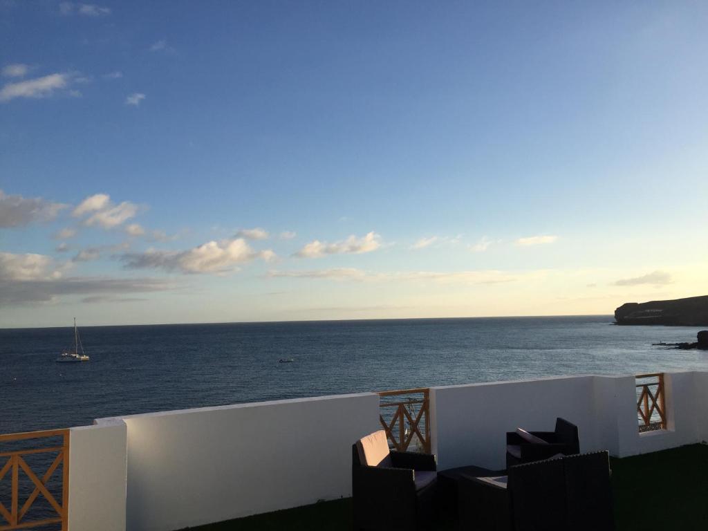 a view of the ocean from a balcony at La Lajita Ocean View 2 in Lajita