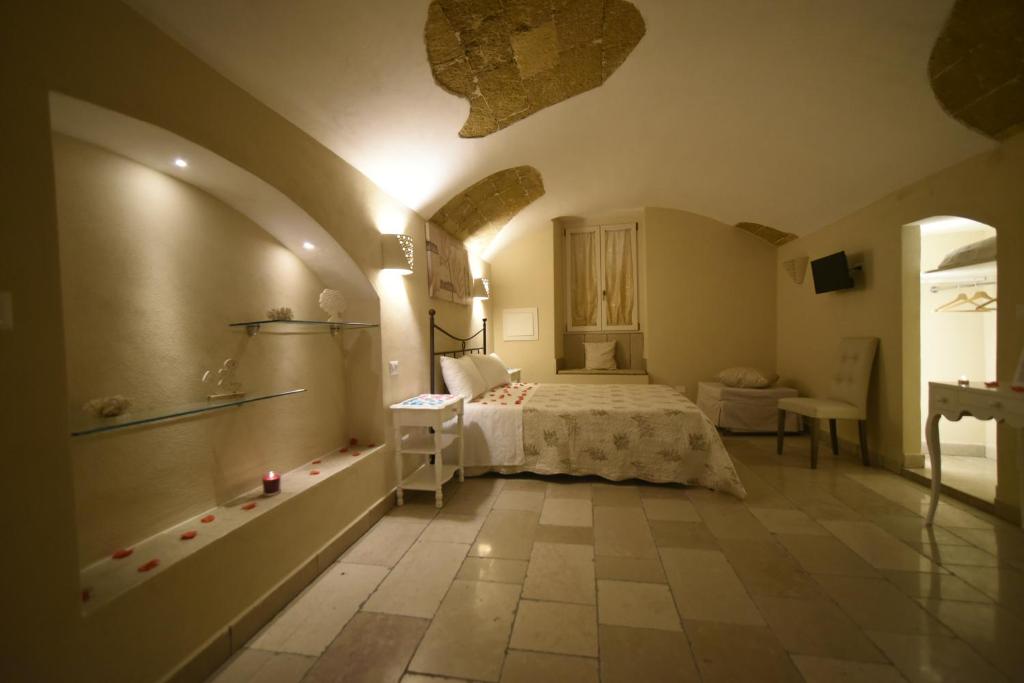 Łóżko lub łóżka w pokoju w obiekcie B&B Corte Cantalupi