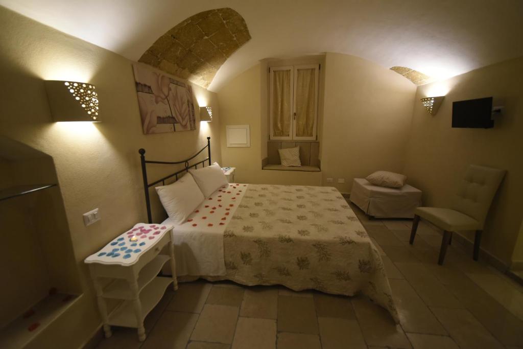 Łóżko lub łóżka w pokoju w obiekcie B&B Corte Cantalupi