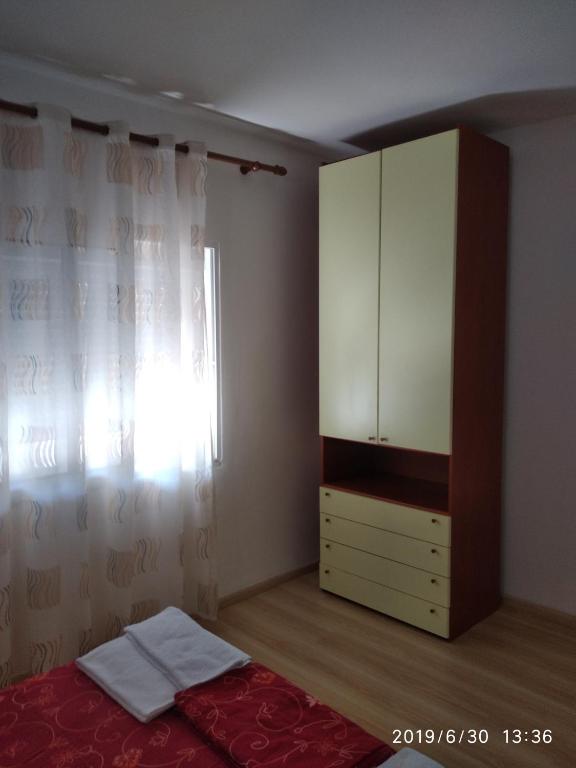 Postel nebo postele na pokoji v ubytování Casa Prifti
