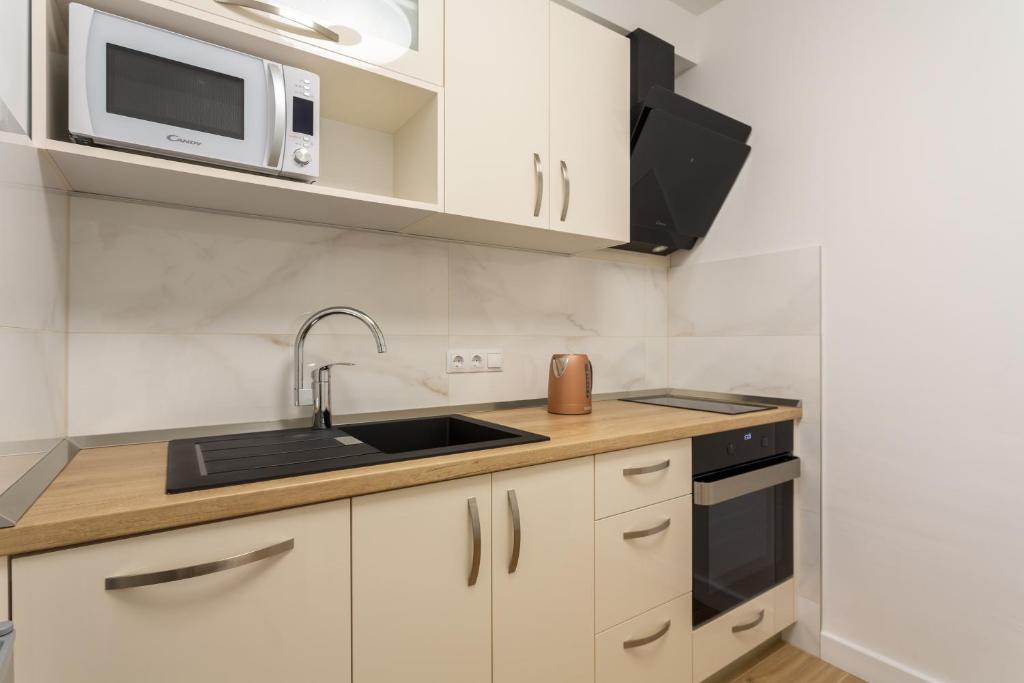 Kuchyňa alebo kuchynka v ubytovaní Villa Stonehouse