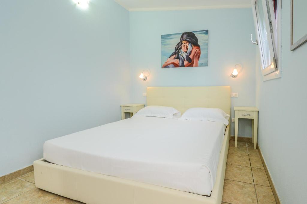 VILLA GARUTI VILLAGE - Apartamento Con Vistas Al Jardín