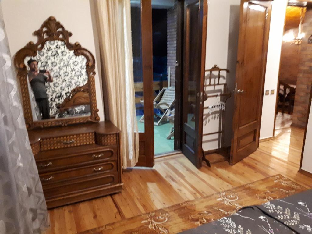 Ένα ή περισσότερα κρεβάτια σε δωμάτιο στο Wine House KNIAZ