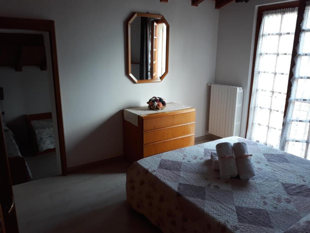 Łóżko lub łóżka w pokoju w obiekcie Maison de Denise
