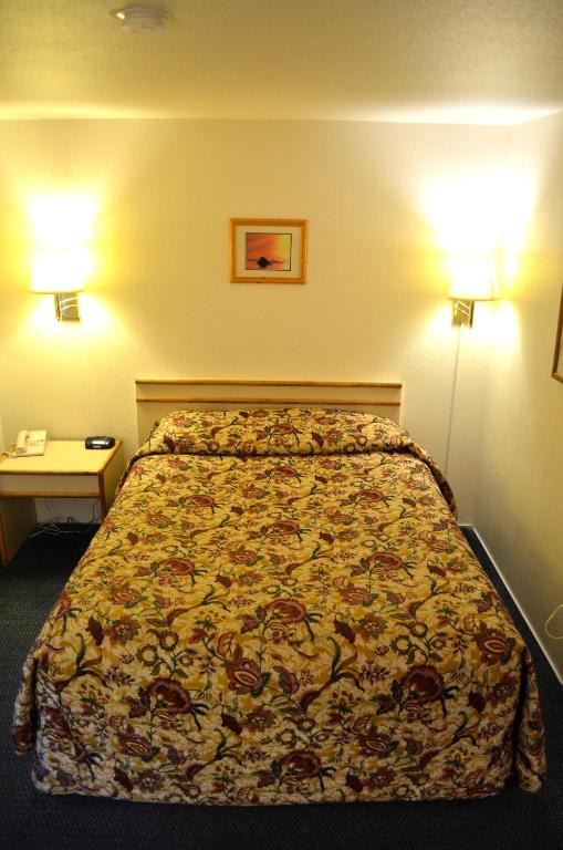 Postel nebo postele na pokoji v ubytování Bellingham Lodge