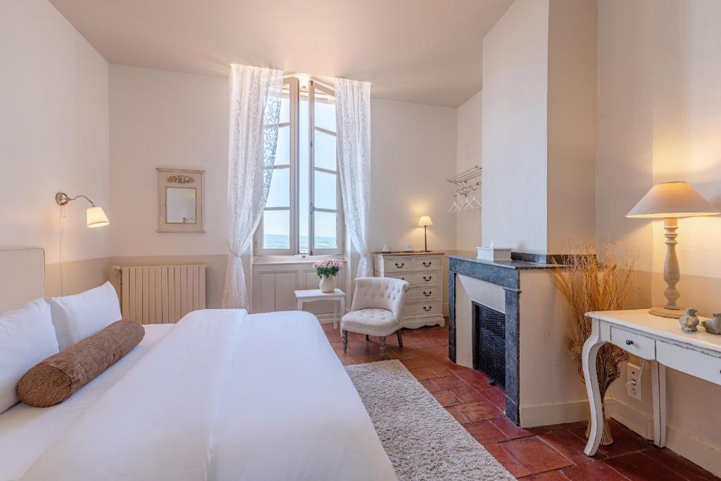 Llit o llits en una habitació de Cap de Castel