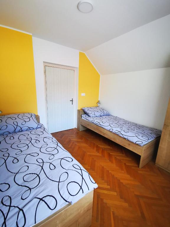 Postel nebo postele na pokoji v ubytování Apartmaji Tomšič