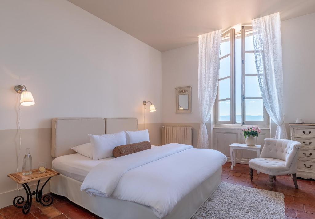 Llit o llits en una habitació de Cap de Castel