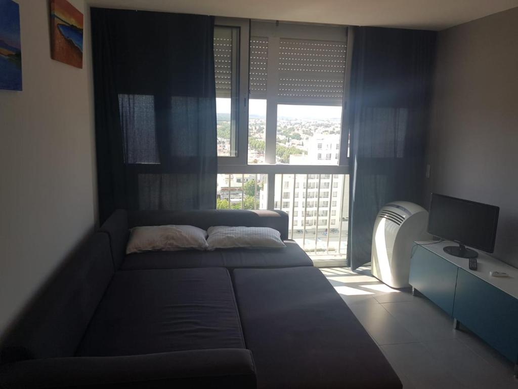 Postel nebo postele na pokoji v ubytování Apartamento Playa Ampuriabrava
