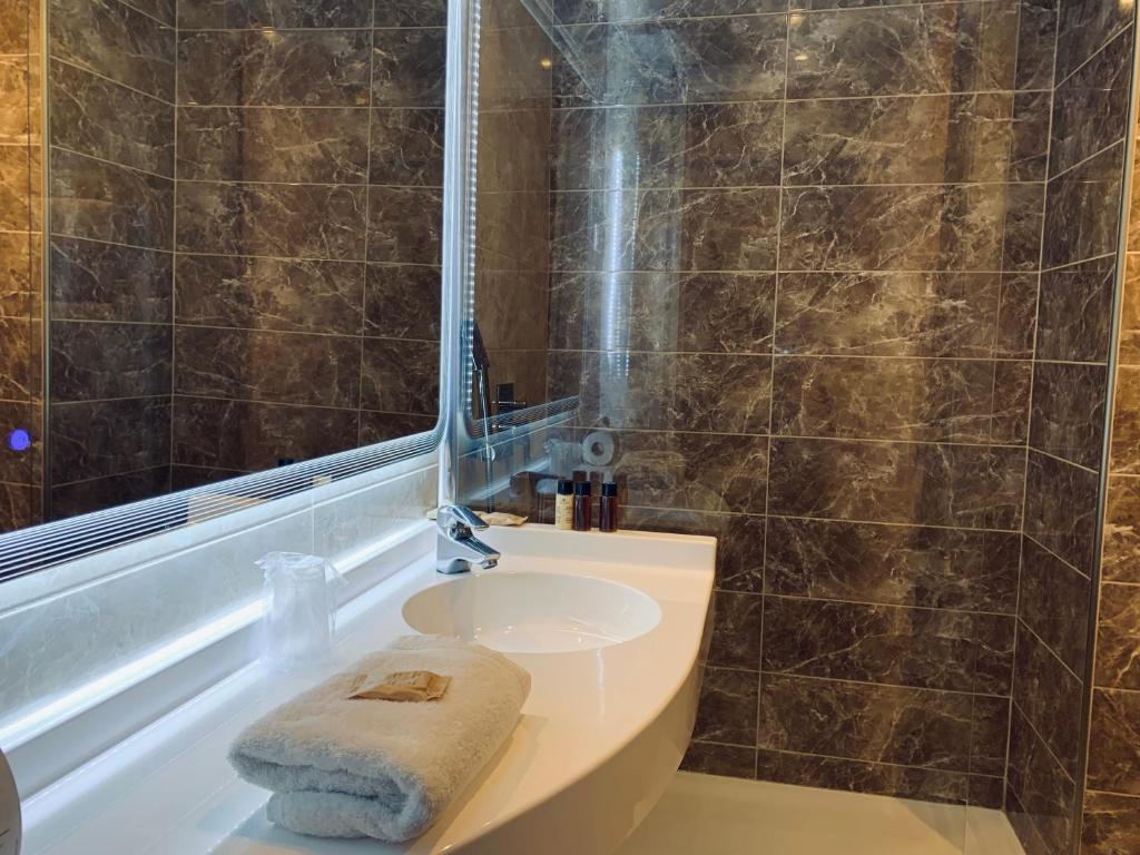 Koupelna v ubytování Hotel Berneron
